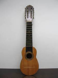 lot 129 image: Vintage Genuine Armadillo Ukulele 