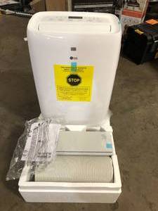 lot 12 image: LG 6,000 BTU (DOE) 115-Volt Portable Air Conditioner LP0621WSR Cools 250 Sq. Ft. with Dehumidifier Function and LCD Remote  Customer Returns See Pictures
