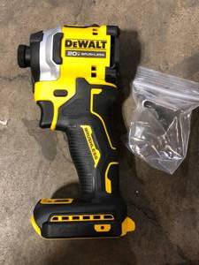 lot 44 image: DEWALT ATOMIC 20V MAX Cordless Brushless Compact 14 in. Impact Driver (Tool Only)  Customer Returns See Pictures