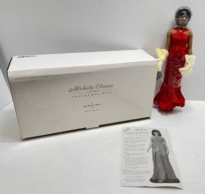 lot 41 image: The Danbury Mint Michelle Obama At The Inaugral Ball Collectors Doll (Missing Wood Base)