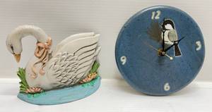 lot 46 image: Vintage Cast Iron Swan Door Stop (HAS CHIP) & Chickadee Pottery Clock