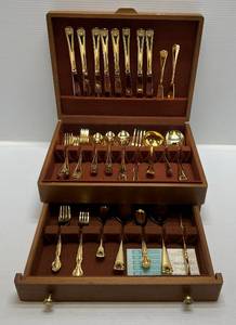 lot 48 image: 61 Pc. Continental Gourmet Japan Gold Plated Silverware Set