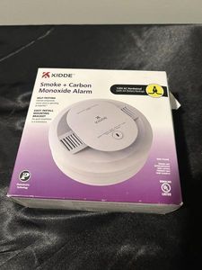 lot 156 image: NIP Kidde Hardwired Smoke & Carbon Monoxide Detector, AA Battery Backup, Interconnectable, LED Warning Light Indicators