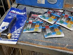 lot 161 image: Auto Accessories (in original packaging) - (4) GRIP Auto Fuse Sets, (1) AC Delco Battery Brush