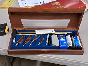 lot 13 image: Outers Deluxe Gun Cleaning Kit (in original packaging) with Designer Wood Case