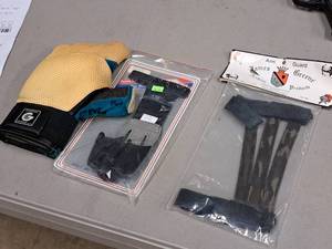 lot 6 image: Archery Accessories - (2) Archery Gloves, (1) James Greene Archery Arm Guard