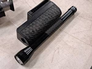 lot 39 image: Flashlight and Mace Spray Holder