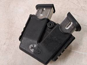 lot 38 image: (2) Springfield Armory 9mm Ammo Clips and (1) Double Ammo Clip Holder
