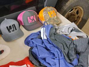 lot 247 image: Lot of (5) Assorted Outdoor Apparrel - WI Waleye XL Hooded Sweatshirt, MN Duck 2XL Hooded Sweatshirt, (3) Hats WIMN Wildlife