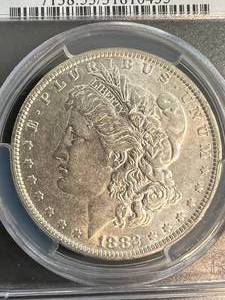 lot 06 image: 1882-OS US MORGAN SILVER DOLLAR PCGS AU53