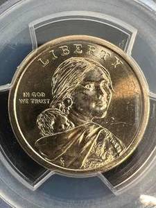 lot 08 image: 2009 US $1 SACAGAWEA PCGS MS66 MISSING EDGE LETTERING