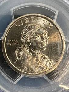 lot 49 image: 2009 US $1 SACAGAWEA PCGS MS66 MISSING EDGE LETTERING