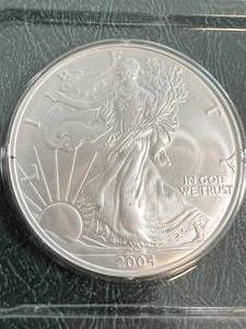 lot 58 image: 2004 AMERICAN SILVER EAGLE 1 TROY OZ .999 FINE SILVER UNC