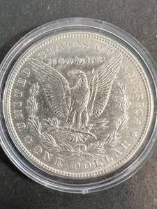 lot 62 image: 1904-O US MORGAN SILVER DOLLAR IN AIRTITE