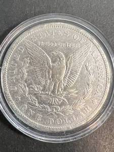lot 67 image: 1886-O US MORGAN SILVER DOLLAR IN AIRTITE