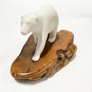 lot 9 image: John Perry Polar Bear Sculpture on Wood Slab