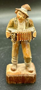 Four Vintage German Wooden Hand Carved Figurines