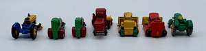 Seven Vintage Toy Matchbox and Lesney Tractors and Farm Equipment