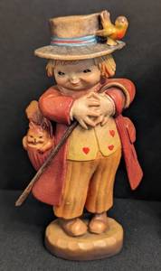 Pair of Anri Hand Carved Wood Figurines including Anri Hand Carved Happy Wanderer Boy Figurine