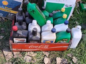 lot 706 image: Lot of (1 Tote) Assorted Automotive Fluids - Motor Oil, Power Steering Flush