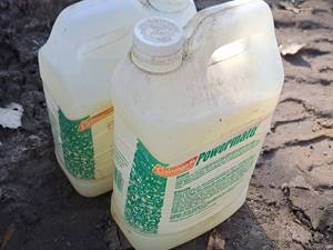 lot 710 image: Lot of (2) Coleman Powermate Pressure Washer Wax Silicone & Carnauba 1-Gallon Plastic Bottles