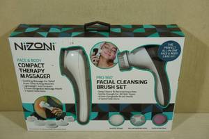 lot 18 image: Nizoni Face & Body Compact Therapy MessagerFacial Cleansing Brush
