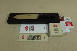 lot 95 image: Ballarini Brenta 7-inch Hollow Edge Santoku Knife