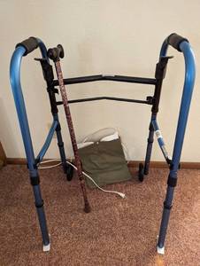 lot 424 image: Walker, Heating Pad, and Walking Cane