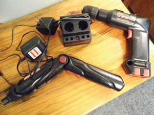 lot 304 image: Metal tool box with 2 Craftsman battery power drills, batteries and charger
