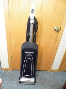 lot 309 image: Oreck vacuum cleaner