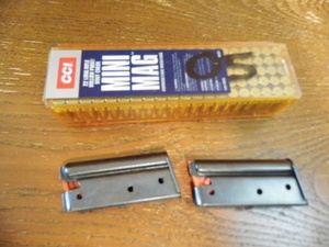 lot 313 image: Box of .22 mini mag rounds and 2 clips