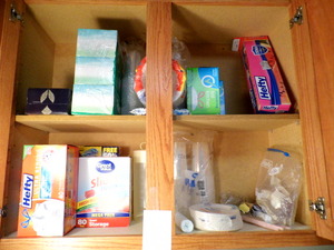 lot 342 image: Cabinet full of disposables, many unopened