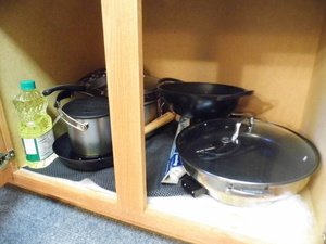 lot 345 image: Cabinet full of cooking and kitchen ware