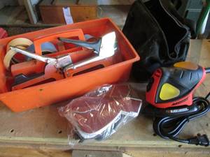 lot 69 image: Black and Decker palm sander with bag and accessories plus Tool caddy, heavy duty staplers and more
