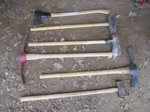 lot 77 image: Maul and pick axe Grouping