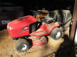 lot 2 image: Toro Wheel Horse 16-38 HXL Riding lawnmower and 6 Bushel twin bagger