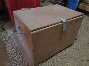 lot 18 image: Handmade wooden storage truck with side handles and locking capability plus a pair of 5 c-clamps and other misc. measures approximately 23.51718