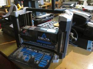 lot 31 image: Delta 12 12 portable wood planer