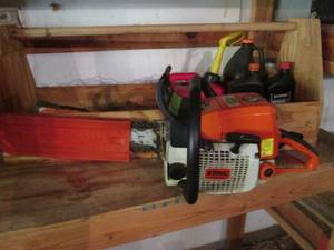 lot 32 image: Stihl 029 gas powered Chainsaw in handmade wood carry case plus lubes, gas can and more