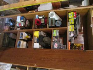 lot 38 image: Content of Shop cabinet to include shop towels and a plethora of screws, nails, wire, with lots of other hardware and accessories