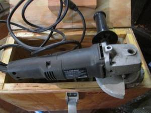 lot 41 image: Sears Craftsman industrial 4 12 angle grinder with some additional cutting discs and hand made wood case