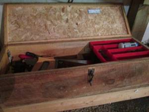 lot 44 image: Hand made wood box containing an assortment of hand saws, levels and more