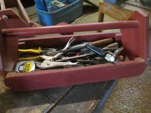 lot 49 image: Hand made wood toolbox caddy with an assortment of vise grips, putty knives, pliers, screwdrivers and other hand tools