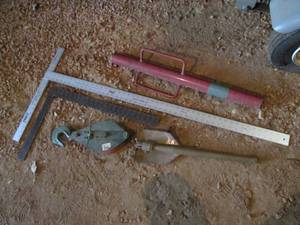lot 468 image: Post pounder, vintage trenching shovel, measuring squares and pully