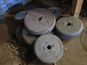 lot 469 image: Assortment of bar weights ranging from 4.4lb to 14.3 lb