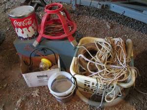 lot 482 image: Basket of assorted ropes,  wooden box, metal Christmas Tree stand, collectible Coca-Cola Tin and other Misc