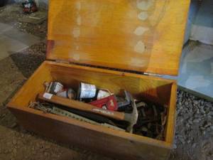 lot 56 image: Hand made toolbox with an assortment of pipe Wrenches, pipe cutters and other plumbing tools and supplies