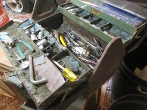lot 57 image: Vintage Metal Kennedy toolbox with an assortment of 12 craftsman and other brand Sockets,  Wrenches, electrical supplies and more