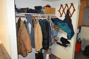 lot 246 image: Assorted Jackets, boots, other clothing (many sizes)  Expandable Coat Rack