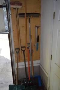 lot 161 image: Snow shovels, windsheild scrapers, and bush brooms